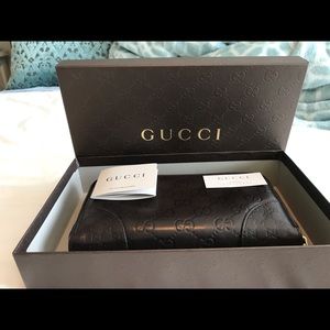 GUCCI GUCCISSIMA LEATHER ZIP AROUND WALLET BROWN